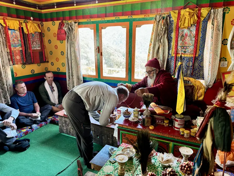 A lama's blessing before the trek