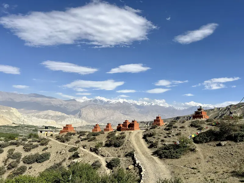 A line of red chortens, Upper Mustang
